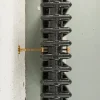 Väggfäste/Tippskydd för radiator - Mässing