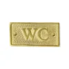 WC-skylt - Mässing